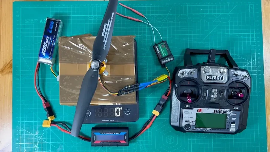 experiment setup materials and tools used to measure thrust.
