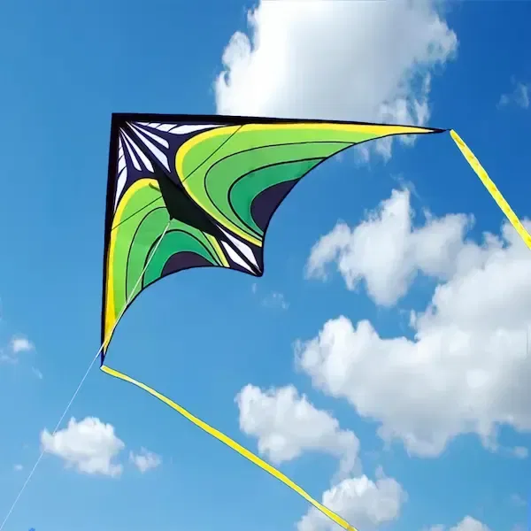 kite flying clouds and blue sky in background