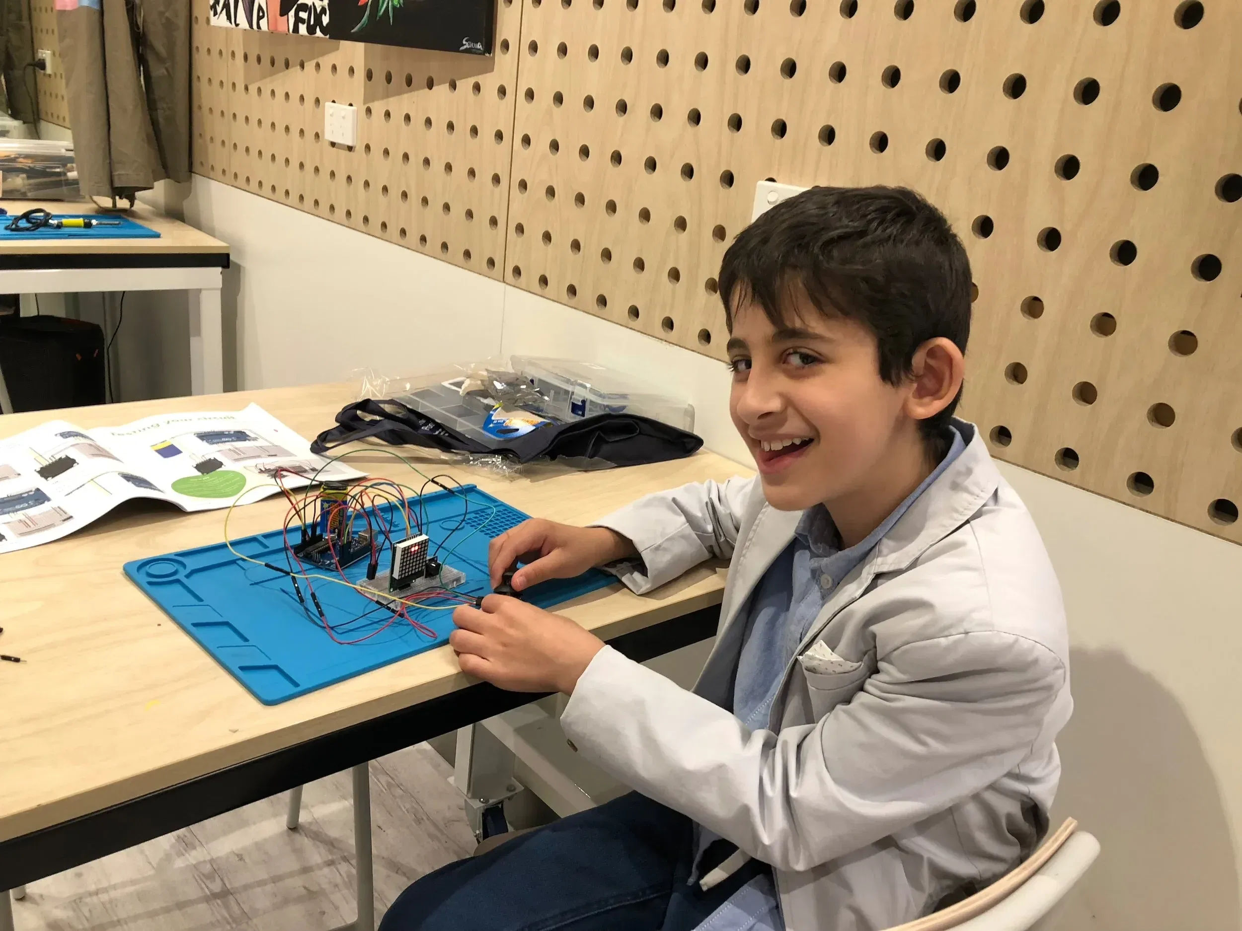 My son having fun with Arduino and electronics